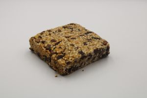 Μπάρα Δημητριακών ( Βρώμη, Σουσάμι, Cranberry,Μέλι & Μαύρη Σοκολάτα) Χωρίς Ζάχαρη